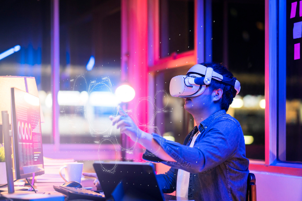 asian-young-male-wearing-wearable-goggle-headset-virtual-online-meeting-digital-space-working-with-3d-augmented-dimension-homecyber-virtual-working-with-virtual-vr-goggle-pc-desktop-device（Free license）.jpg